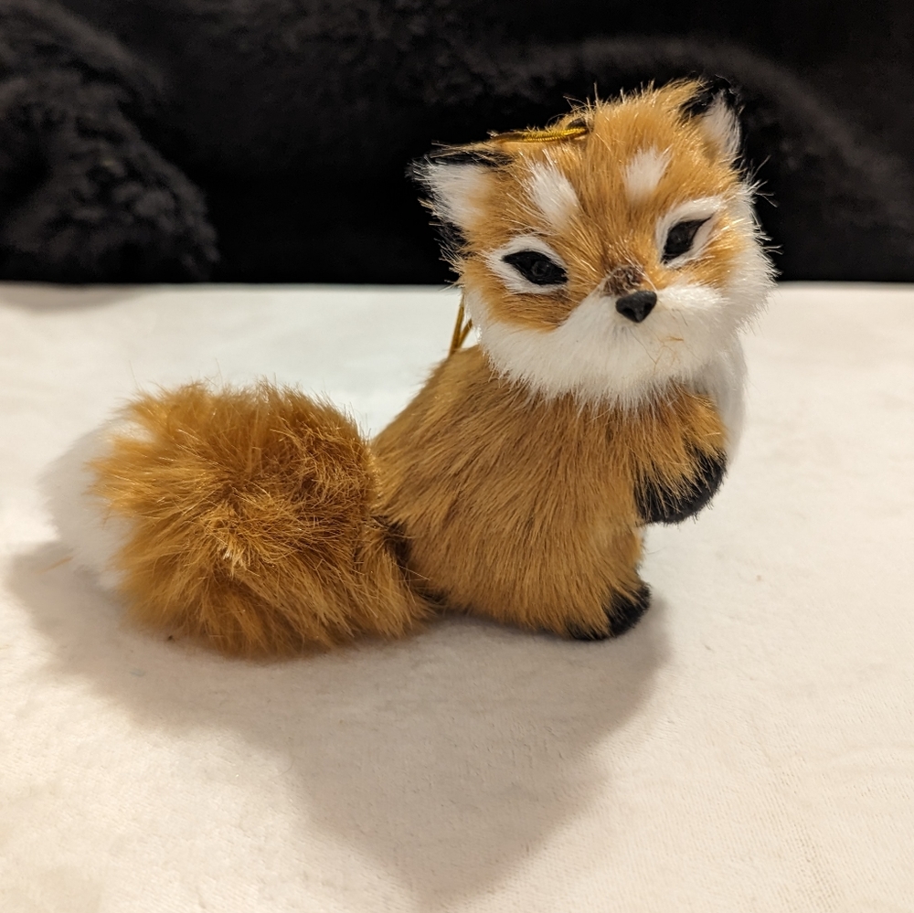 Adorable soft fur golden fox ornament..